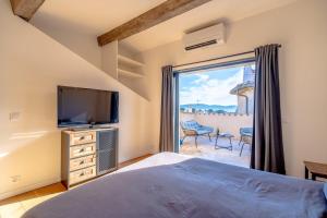 Villas Magnifique Maison de Village climatisee, terrasse : photos des chambres