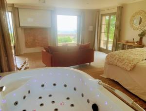 Linstant Beaujolais 2 ou 4 personnes Logis cosy balnéo vue jardin