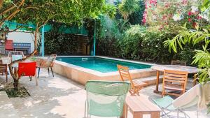 Grande chambre cosy avec kitchenette, salle de bain et WC privatif