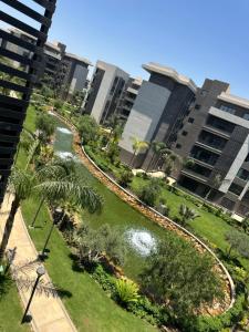 Luxurious Studio overlooking a lake in Privado Madinaty