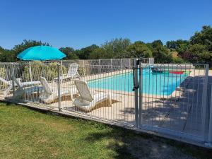 Maisons de vacances Gite de 9 personnes avec piscine : photos des chambres
