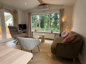 Luxe chalet op 5-sterren camping, 4P, ruime veranda, 2 fietsen