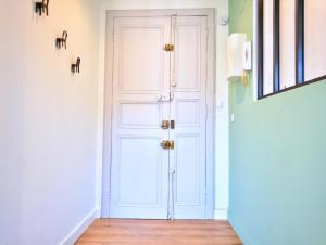 Appartements Charmant deux pieces en coeur de ville : photos des chambres