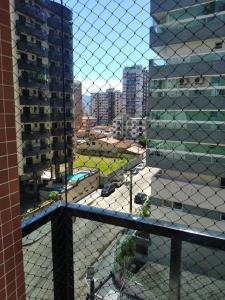 2 Quartos com Varanda sendo 1 Suíte, Cozinha completa, Vista Mar - Condomínio Frente Mar, Lazer completo com Piscina coberta e aquecida, Estacionamento, Portaria 24h - Apto indicado para Grupos, Famílias e Hóspedes a Trabalho, Praia da Guilhermin