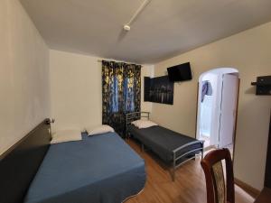 Hotels Hotel Les Rosiers : photos des chambres