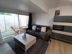 Appartements Studio cozy proche Paris - Aeroport Roissy Charles-de-Gaulle : photos des chambres