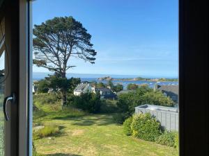 Maisons de vacances House with sea view and large garden for 8 people : photos des chambres