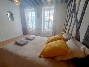 Appartements Au petit Paris - Centre Ville : photos des chambres