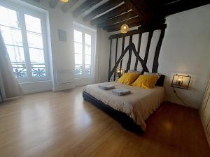 Appartements Au petit Paris - Centre Ville : photos des chambres