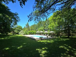 Maisons de vacances Gite de caractere avec piscine partagee au coeur du Perigord Noir - FR-1-616-484 : photos des chambres