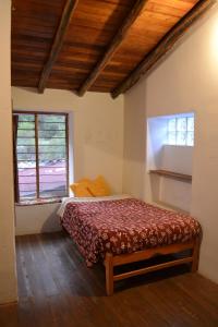 Cabaña rodeada de naturaleza en Ollantaytambo