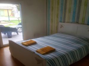 Maisons de vacances Holiday Home in La Teste with Pool & BBQ, cleaning included : photos des chambres