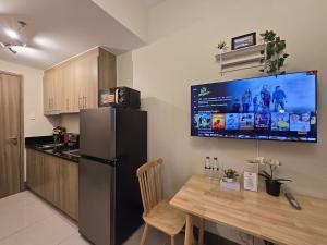 1BR Condotel with Balcony at FAME Residences #FM39-1