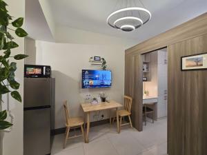 1BR Condotel with Balcony at FAME Residences #FM39-1