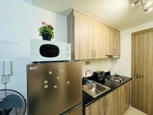 1BR Condotel with Balcony at FAME Residences #FM42-1