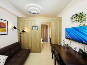 1BR Condotel with Balcony at FAME Residences #FM42-1