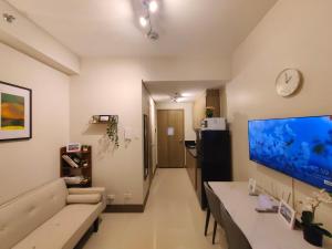 1BR Condotel with Balcony at FAME Residences #FM51-1