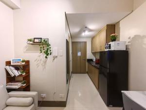 1BR Condotel with Balcony at FAME Residences #FM52-1