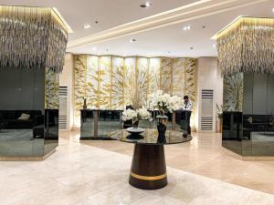 1BR Condotel with Balcony at FAME Residences #FM54-1