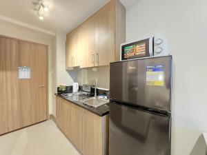 1BR Condotel with Balcony at FAME Residences #FM59-1