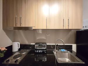 1BR Condotel with Balcony at FAME Residences #FM60-1