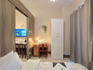 1BR Condotel with Balcony at FAME Residences #FM61-1