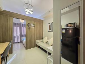 1BR Condotel with Balcony at FAME Residences #FM63-1