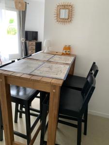 Appartements La colline aux oiseaux : photos des chambres