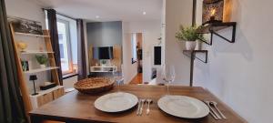 Appartements Le Cocon de Soubise - Centre-ville et calme : photos des chambres