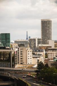 Appartements Appt with Eiffel Tower view at Paris La Defense : photos des chambres