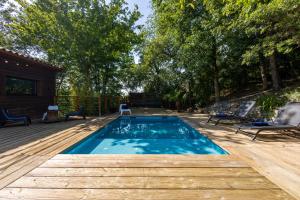 Maisons de vacances L-Eden - Maison d-architecte, Climatisee, Piscine, Home Cinema : photos des chambres
