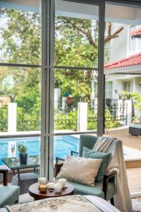 ELIVAAS Prive Suntuarios Casa Iris 4 BHK Getaway with Jacuzzi, Pvt Pool & Gazebo