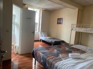 Hotels Hotel Du Commerce : photos des chambres