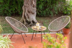 Villa Teix de Bonaire para 10, jardines y vista mar