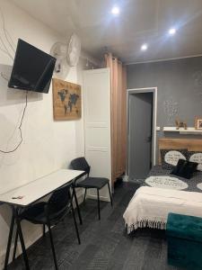 Appartements Studio en centre-ville : photos des chambres