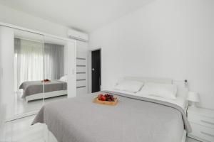 Paraiso Nadmorskie Apartamenty z Basenem i Parkingiem by Noclegi Renters