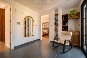 SaffronStays Rio - 4BR pet-friendly villa with glass-bottom pool, rooftop party zone & bar near Candolim & Coco Beach