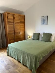 Maisons de vacances T2 dans villa avec piscine : photos des chambres