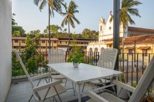 SaffronStays Rio - 4BR pet-friendly villa with glass-bottom pool, rooftop party zone & bar near Candolim & Coco Beach