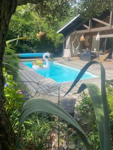 Maisons de vacances Villa piscine chauffee & spa sur le Bassin d Arcachon - proche plage et ocean : Maison 4 Chambres