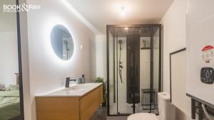 Appartements Lucon and Chill - Hammam & Videoprojecteur : photos des chambres