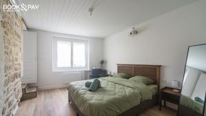 Appartements Lucon and Chill - Hammam & Videoprojecteur : photos des chambres