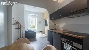 Appartements Lucon and Chill - Hammam & Videoprojecteur : photos des chambres
