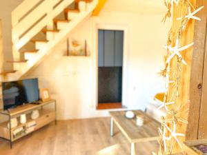 Maisons de vacances Paisible maison a l'ombre des pins : photos des chambres