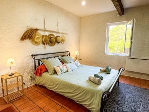 Maisons de vacances Paisible maison a l'ombre des pins : photos des chambres