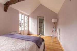 B&B / Chambres d'hotes Chambre Villesavin - piscine interieure - jacuzzi : photos des chambres