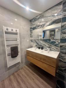 Appartements Piscine & Spa : photos des chambres