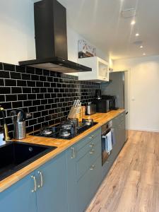 Appartements Piscine & Spa : photos des chambres