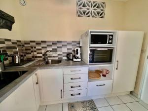 Appartements Studio charmant avec terrasse ensoleillee et parking a Quiberon - FR-1-478-314 : photos des chambres