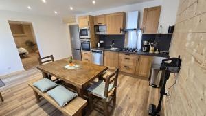 Appartements Les Crocus Oasis de bien etre avec SPA et SAUNA : photos des chambres